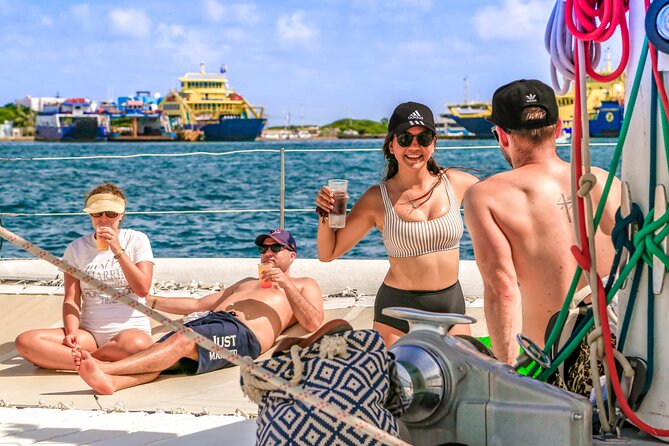 Catamaran Tour to Isla Mujeres Open bar and Lunch - Isla Mujeres Town Time: One Hour Means Pick a Simple Goal