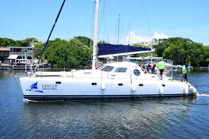 Catamaran Tour to Isla Mujeres, Open bar, Lunch, Snorkeling, Beach Club Included - On Board Vibe: Crew Energy, Games, and the Party Factor