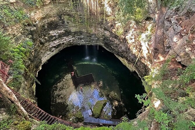 Chichén Itzá Premium Cenote y valladolid Day Tour - Suytun Cenote swim: platform photos and the “yes, it is cold” moment