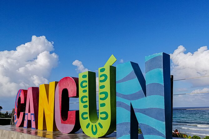 City Tour, Cultural Experience at Cancun! Private Transportation - Playa Delfines: the Cancun letters plus Caribbean views, fast and sweet