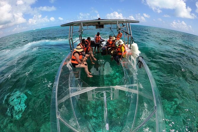 Crystal Boat Tour to Isla Mujeres and Reefs - Crystal boat reef time from Isla Mujeres, and why the route works