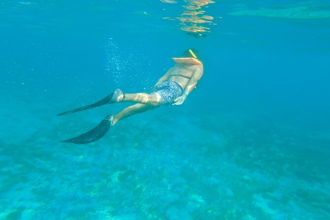 Dancer Cruise Isla Mujeres Snorkel Food and Drinks Included - Bathrooms, lifeguards, and safety reality on a party boat