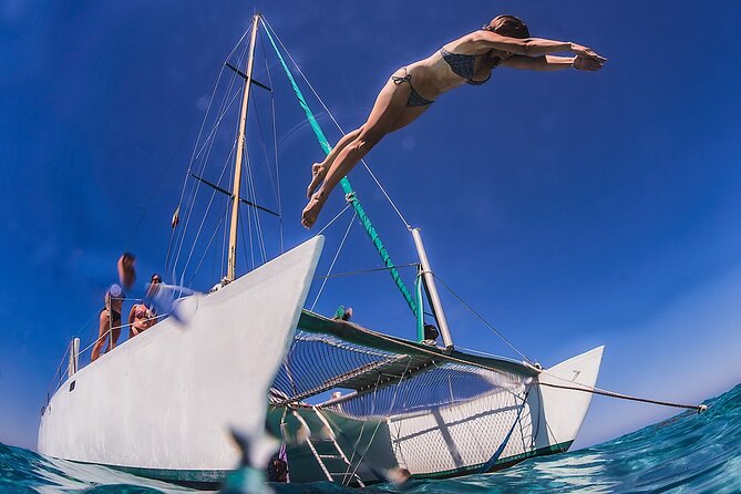 Discover Isla Mujeres: Catamaran, Snorkeling, and "Ice Bar" - Getting on the Water: Pickup Windows and Marina Wait Time