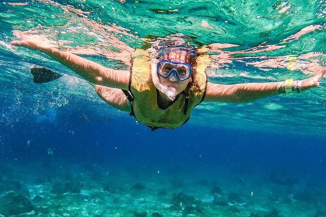 Exciting Catamaran Tour to Isla Mujeres, from Cancún! - The onboard experience: open bar energy and what to wear on a boat