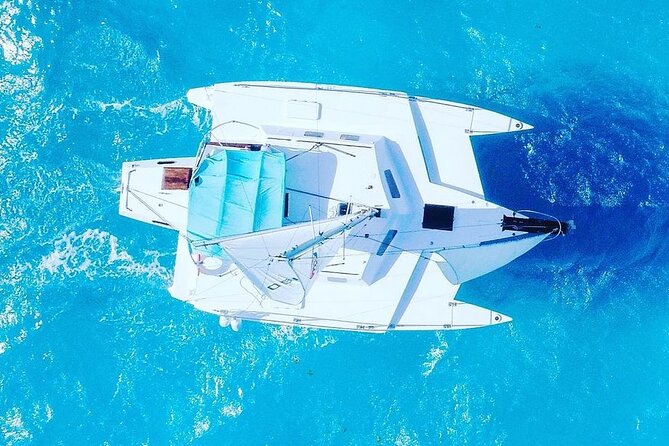 Exciting Catamaran Tour to Isla Mujeres, from Cancún! - Snorkeling off Isla Mujeres: included gear, but expect structure and limited time