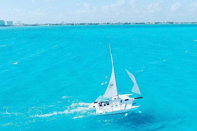 Exciting Catamaran Tour to Isla Mujeres, from Cancún! - Beach club lunch and included buffet: convenient, but quality varies