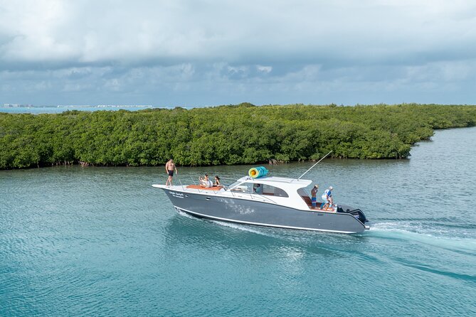 Exclusive Isla Mujeres and Cancun Private Yacht Tour - Playa Norte, Isla Mujeres: the beach break that makes the trip