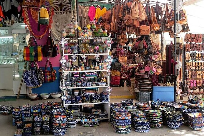 Explore Cancun City Tour! Round Bus transportation - Plaza La Fiesta: outlet shopping and tequila tasting