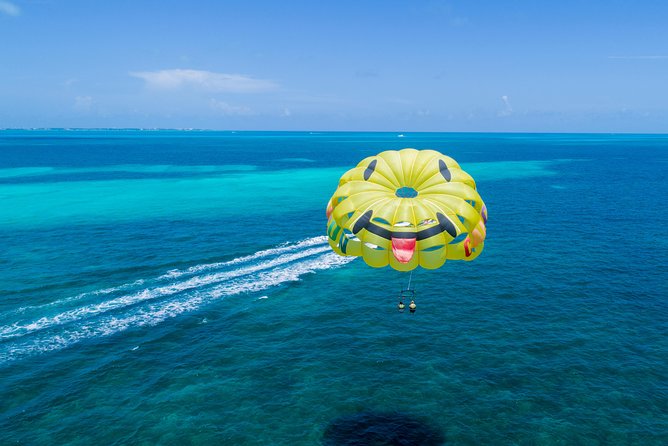 Fly Above Cancun Bay: Parasailing Experience - Getting there: pickup, marina check-in, and the water taxi transfer