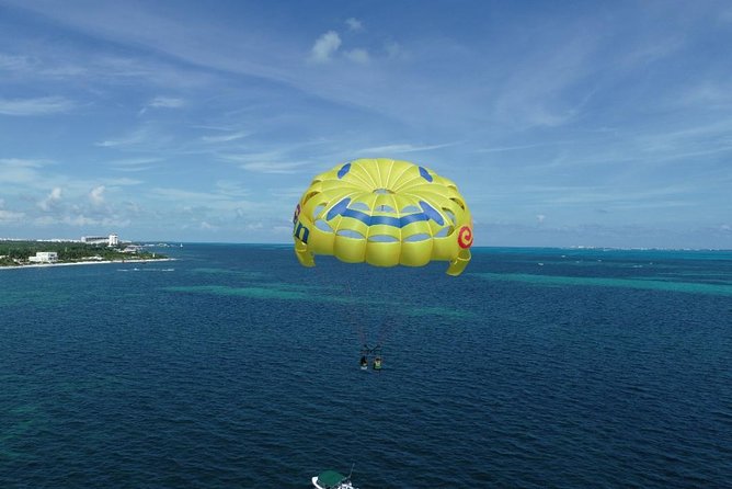 Fly Above Cancun Bay: Parasailing Experience - Safety and the crew vibe: harnessing, life jackets, and real oversight