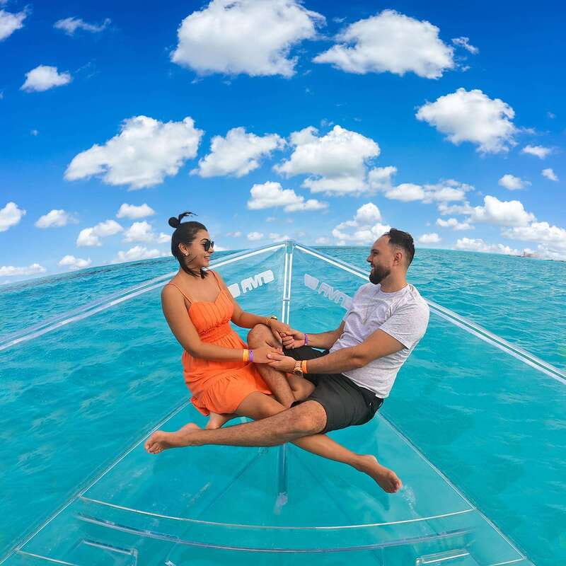 From Cancun: Glass Boat Sightseeing Trip - Open sea cruising: sky blue water, plus fish and other chances