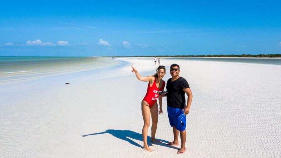 From Cancun or Puerto Morelos: Holbox Boat Tour with Lunch - Yalahau cenote time at Hoyo Negro Yalahau: nature-focused swimming