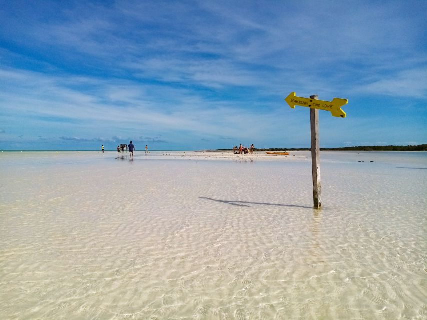 From Cancun or Puerto Morelos: Holbox Boat Tour with Lunch - Punta Mosquito, lunch, and the waterline photos