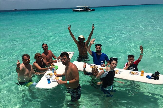 From Isla Mujeres/Riviera Maya: Swim with whale sharks!! - What happens in the first hour: breakfast, briefing, and getting geared up