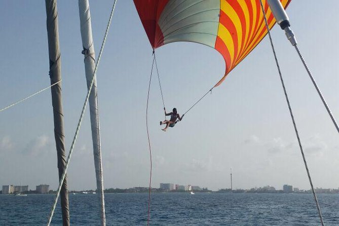 Full-day Isla Mujeres All-inclusive Cruise from Cancún - Boarding the Catamaran: Classic Party vs Luxury Reduced-Group Feel