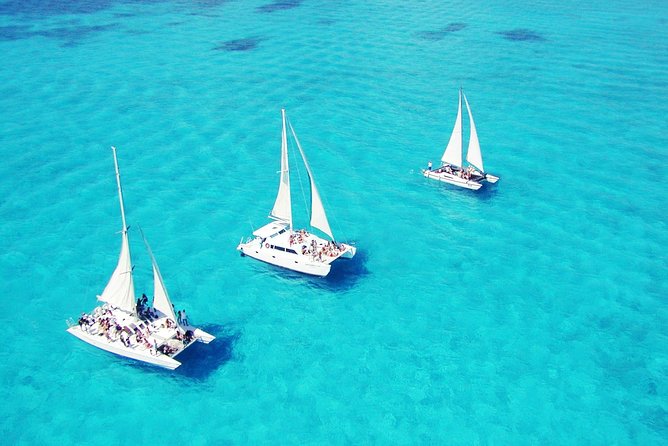 Full-Day Sailing Adventure to Isla Mujeres - On Board: Catamaran Comfort, Music, and an Easygoing Crew