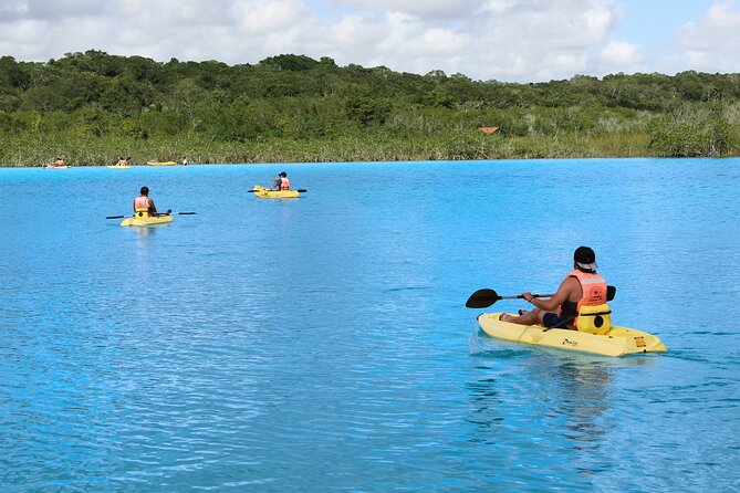 Full day tour to BACALAR, Beach Club, Kayak and an amazing Cenote - Cenote Azul swim time and breakfast before the lake