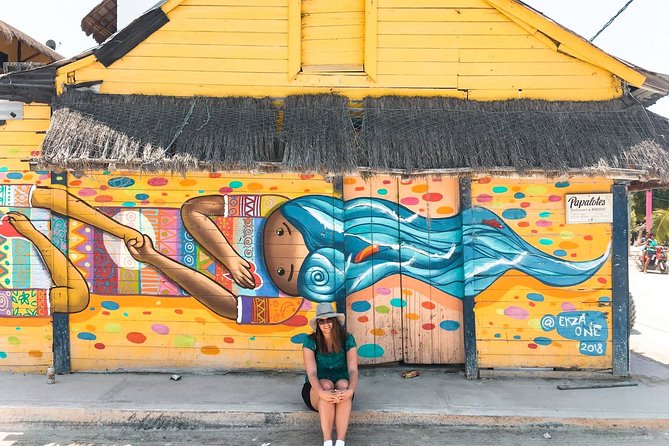 Holbox and Passion Island Full-Day Tour with Cenote, Transportation and Lunch - Hoyo Negro Yalahau cenote swim: turquoise water, provided life vest