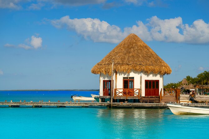 Holbox and Passion Island Full-Day Tour with Cenote, Transportation and Lunch - Isla Pasión by boat: a short romantic legend stop