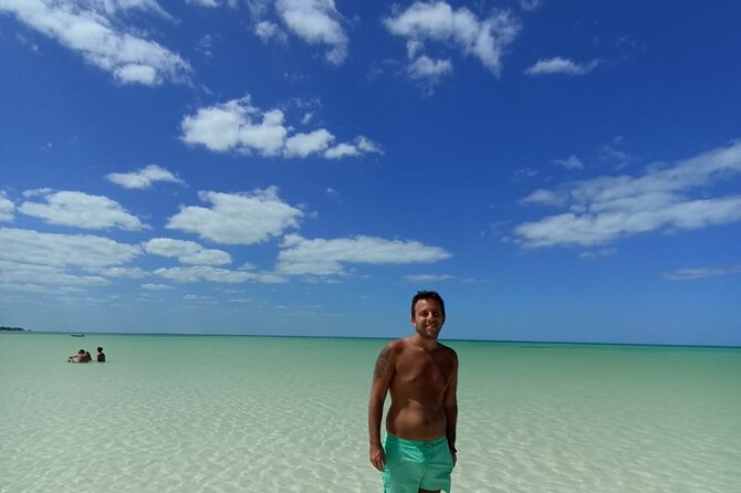 Holbox Island Tour Golf Cart Ferry with Lunch and Transportation - Punta Mosquito: A Sea-Only Beach With Flamingo Season Magic