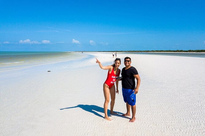 Holbox Tour - Pasion Island & Cenote from Riviera Maya - Punta Mosquito: the sky-mirror water for classic Holbox shots