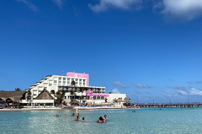 Isla Mujeres Basic Tour in Catamaran with Snorkel and Open Bar - Stop 2 at Arrecife El Meco: snorkeling with guided help