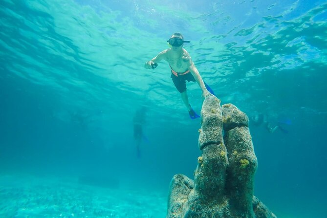 Isla Mujeres Catamaran Luxury Sailing Experience from Puerto Morelos - Stop 4: Isla Mujeres downtown on Calle Hidalgo for food and souvenirs
