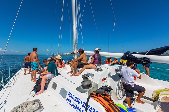 Isla Mujeres Catamaran, Open Bar & Optional Buffet and pick up - From Cancun’s Marina Las Perlas: check-in, dock tax, and pickup reality