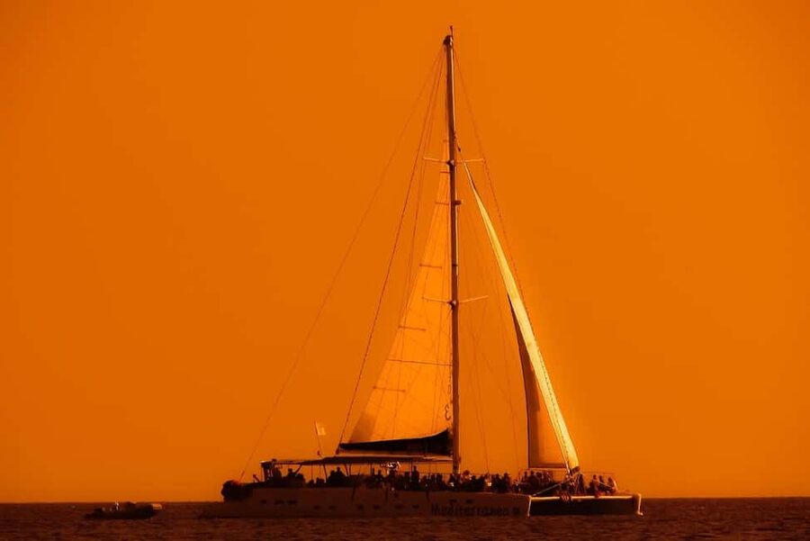 Isla Mujeres: Catamaran Ride with Open Bar, Snorkeling, and Lunch - The catamaran cruise: smooth sailing plus a party that stays friendly
