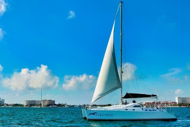 Isla Mujeres Catamaran Sailing Experience with Lunch & Open Bar - Towels, heat, and the small charges that can spoil a perfect day