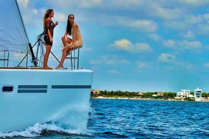 Isla Mujeres Catamaran Sailing Experience with Lunch & Open Bar - Twin-hulled catamaran sailing: what you actually get from the “stable” part