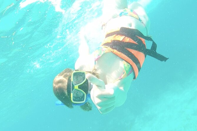 Isla Mujeres Catamaran Tour from Cancun with Snorkel and Open Bar - Safety, Comfort, and Boat Conditions on a Busy Day