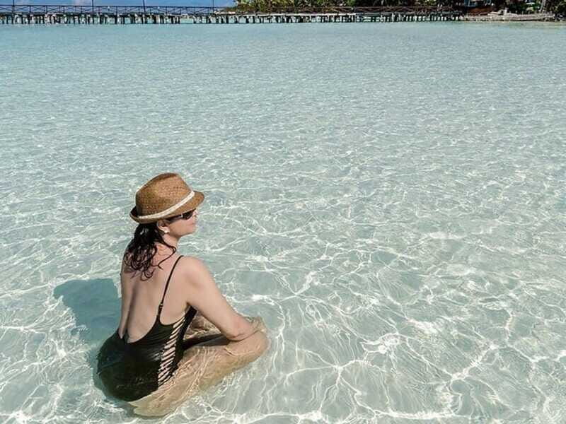 Isla Mujeres Catamaran Tour: Snorkel & Beach Adventure - The onboard tequila party: fun finale, group energy included