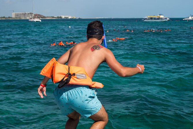 Isla Mujeres Catamaran tour with Open Bar, Lunch and Snorkeling - Short Island Walk for Photos: Do It Fast, Do It Right
