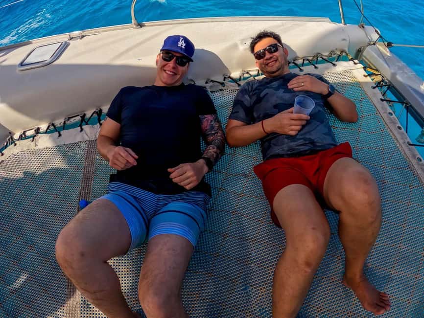 Isla Mujeres Catamaran Tour with Snorkeling & Open bar - Weather and sea conditions: Why the same tour can feel totally different