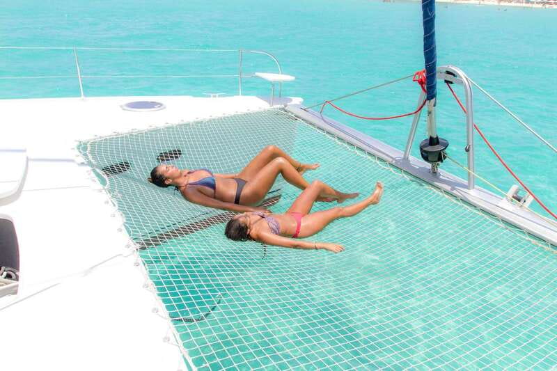 Isla Mujeres: Catamaran with Open Bar, Snorkeling and Lunch - Sailing out of Cancun: music, drinks, and a fast settling-in period