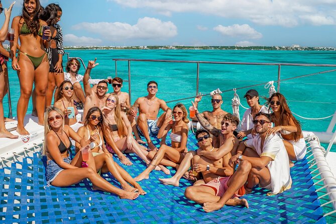 Isla Mujeres Cruise with Beach Club, Snorkel, Lunch and Open Bar - Getting on board: pickup, check-in, and not losing your spot