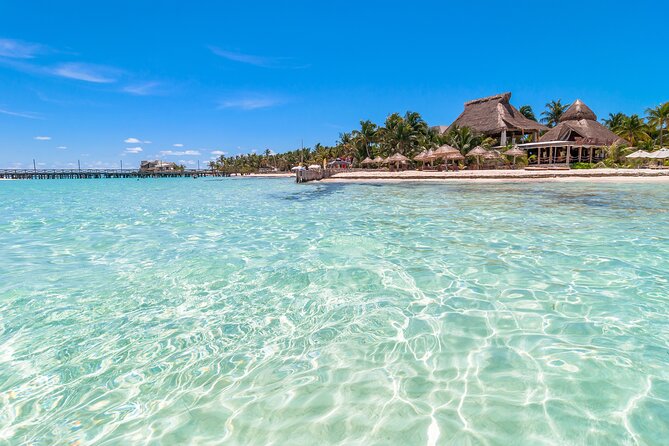 Isla Mujeres Day Tour with Catamaran, Snorkeling & Beach Club - The Catamaran Vibe: Party Energy vs Chilling Out