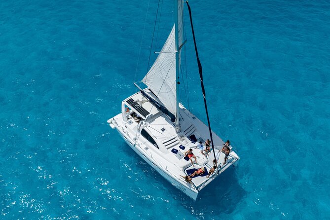 Isla Mujeres Day Tour with Catamaran, Snorkeling & Beach Club - The Real Itinerary: Reef Stop, Playa Club Lunch, and Island Free Time