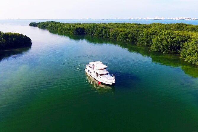 Isla Mujeres Full Day Tour on Yacht with Snorkel and Buffet - Snorkeling at Punta Norte: Gear Included, Conditions Not Guaranteed