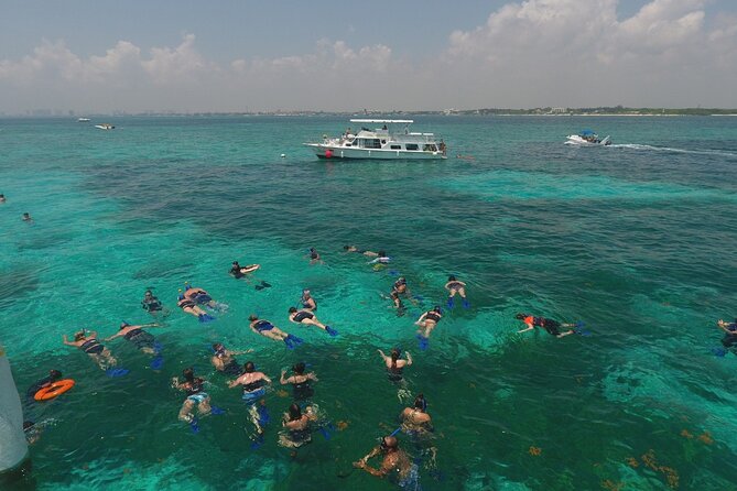 Isla Mujeres Full Day Tour on Yacht with Snorkel and Buffet - Isla Mujeres Time: Playa Norte and Downtown on Your Own