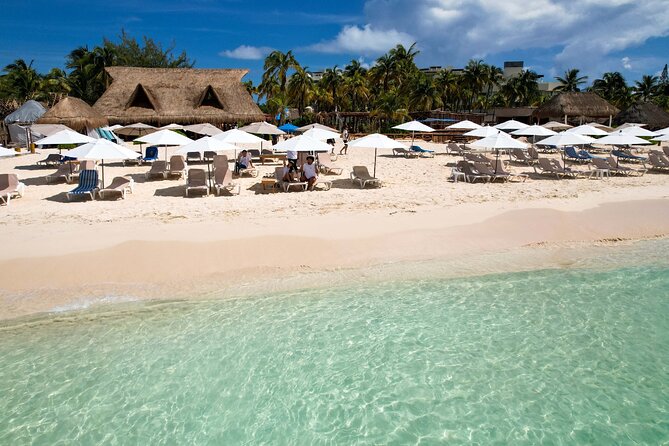 Isla Mujeres luxury catamaran with premium open bar and lunch - Extras to Budget For: Reef Tax, Tips, and Photo Upsells