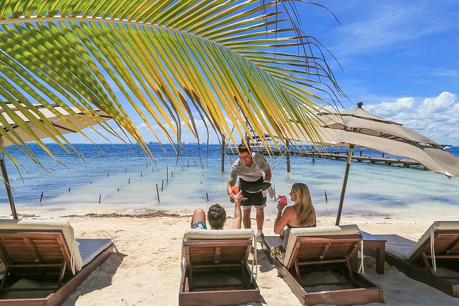 Isla Mujeres luxury catamaran with premium open bar and lunch - Isla Mujeres Downtown for an Hour: Shopping, Beaches, and a Golf Cart Shortcut