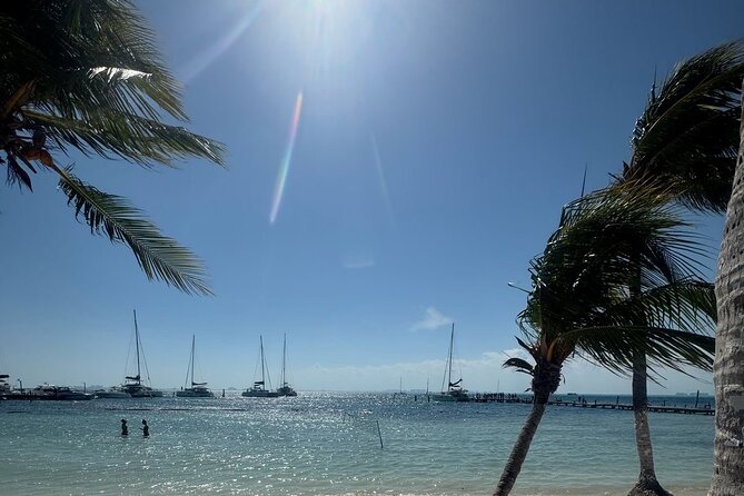 Isla Mujeres Plus Tour with Snorkeling Buffet and Open Bar - Isla Mujeres sunset sailing: music, drinks, and a coast-viewing rhythm