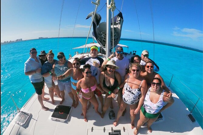 Isla Mujeres Premium Catamaran Tour with transportation from Playa del Carmen - Isla Mujeres time: beach breaks, snorkeling style, and how to use the hours