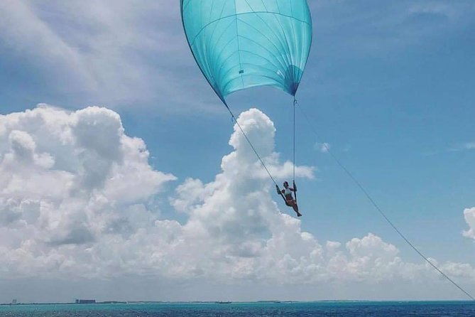 Isla Mujeres Premium Catamaran Tour with transportation from Playa del Carmen - Onboard comfort, snorkeling gear, and the open bar reality