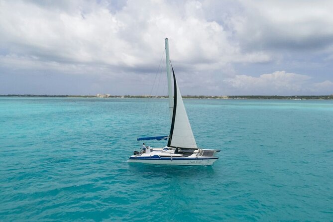 Isla Mujeres Premium Tour in Catamaran with Snorkel and Buffet - Boarding at Playa Tortugas, then straight to the water