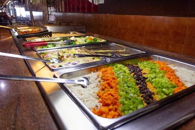 Isla Mujeres Premium Tour in Catamaran with Snorkel and Buffet - Club Playa Mexico: buffet lunch, open bar, and showers