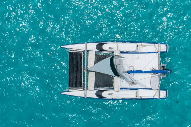 Isla Mujeres Premium Tour in Private Catamaran with Lunch - Isla Mujeres Sunset Return, Plus the Spinnaker If You Get Lucky
