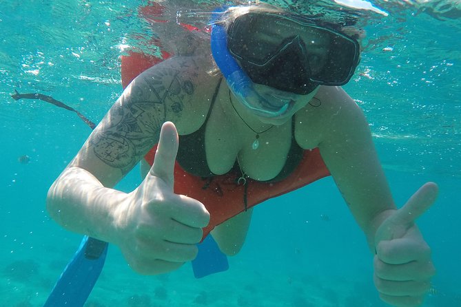 Isla Mujeres Snorkeling Tour Adventure - Stop 1: Lighthouse Reef snorkel for first-time confidence